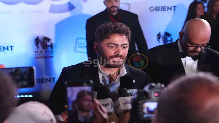 صور | تامر حسني وكزبرة من العرض الخاص لفيلم "ريستارت"