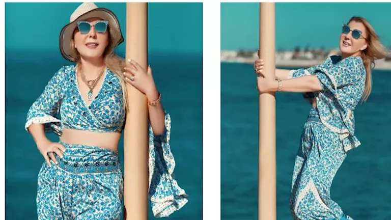 نادية الجندي تستعرض رشاقتها أمام البحر بالمصيف والجمهور يغازلها (صور)